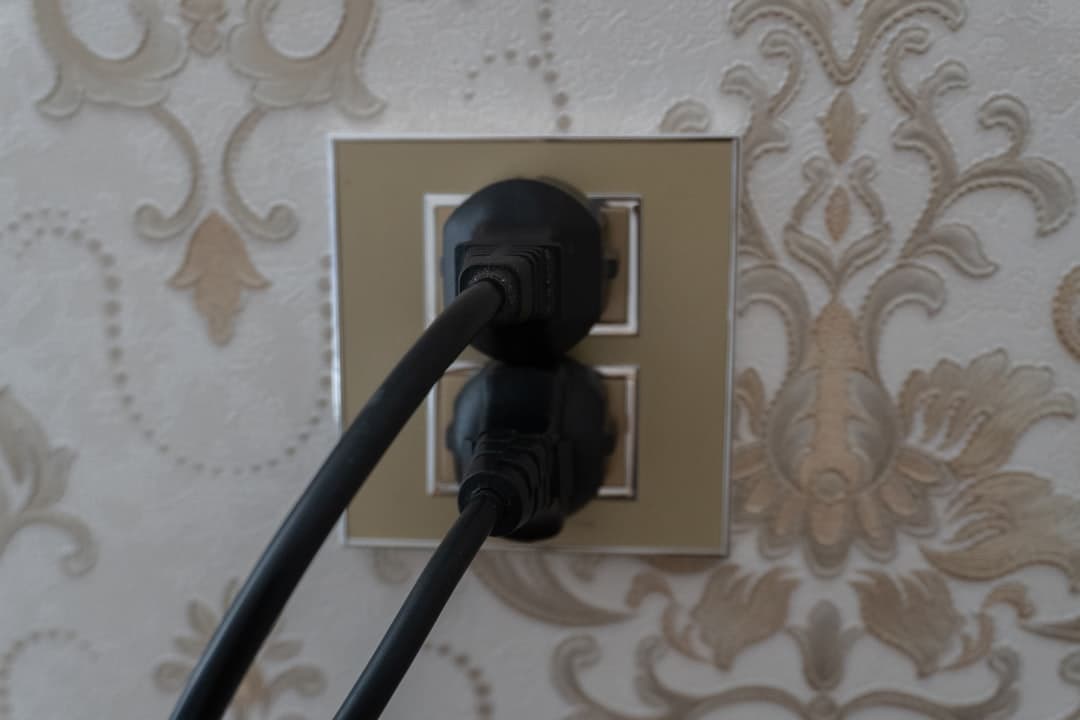 Morocco plug type β close-up of a Type C/E wall socket with a two-round-pin European plug inserted