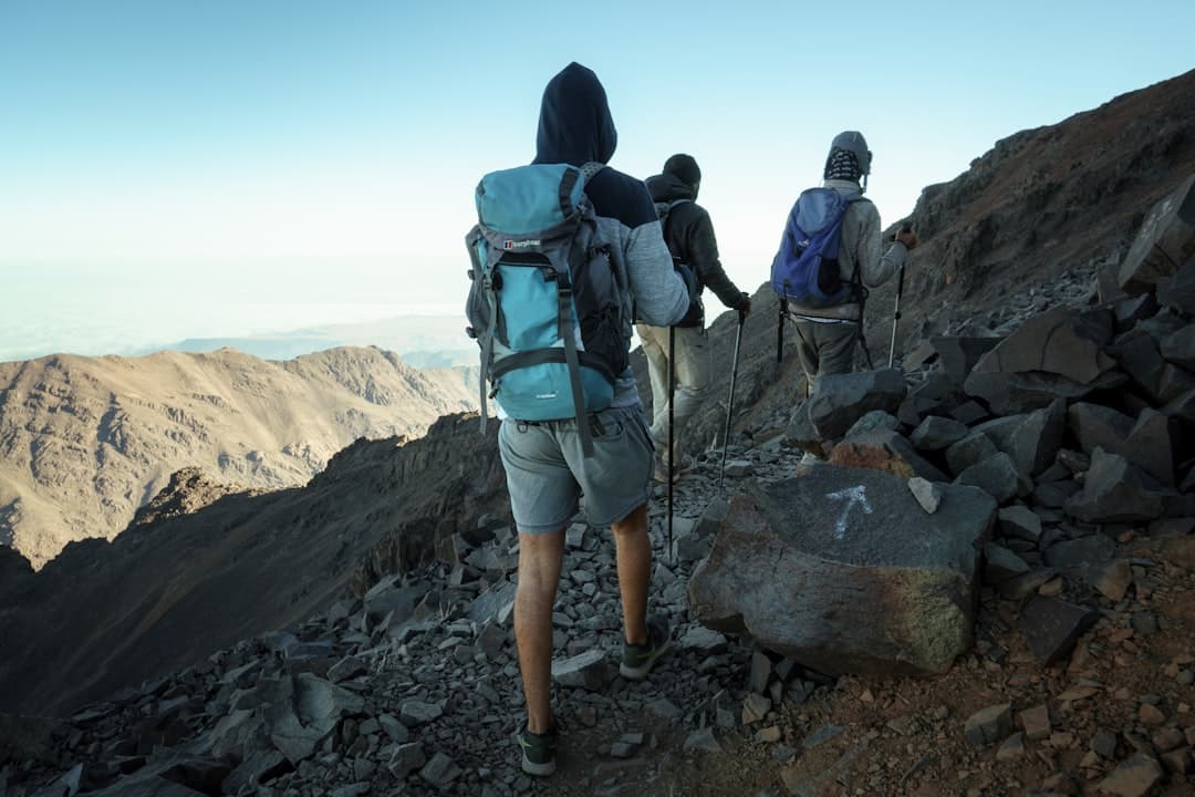 Mount Toubkal trek β trekkers on the summit ridge of North Africa's highest peak (4,167m) in the High Atlas