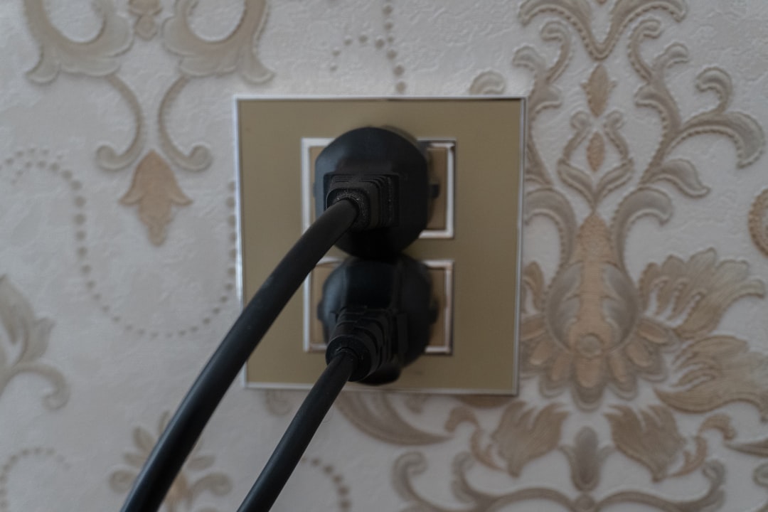 Morocco plug type β close-up of a Type C/E wall socket with a two-round-pin European plug inserted