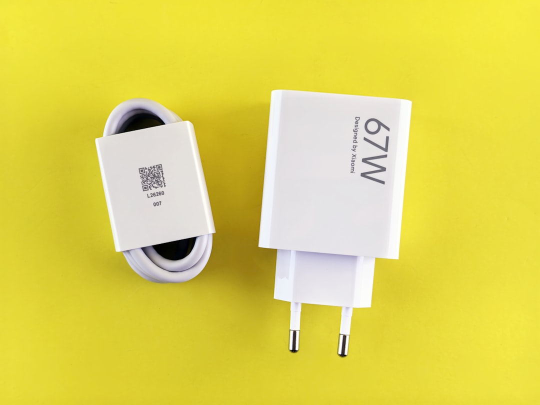 Travel adapter packing flat-lay β universal adapter, multi-port USB charging block and cables for Morocco